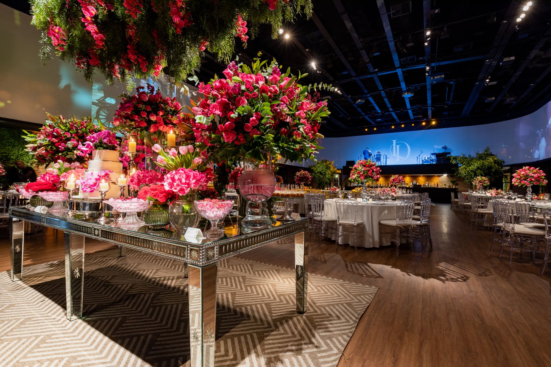 Lavish wedding reception with vibrant floral arrangements and elegant table setup. — Interior Design - The Secrets Of Home In